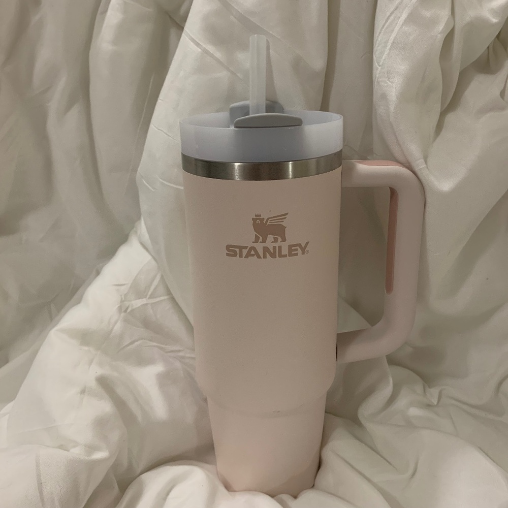 30oz pink Stanley cup with flower & clear stoppers